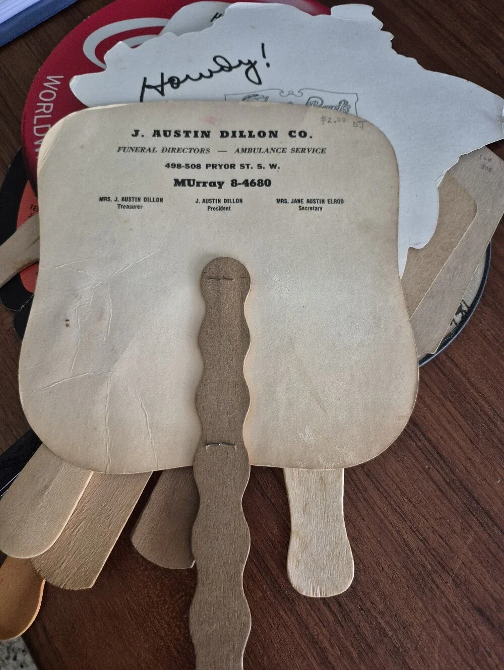 Assorted vintage advertising fans